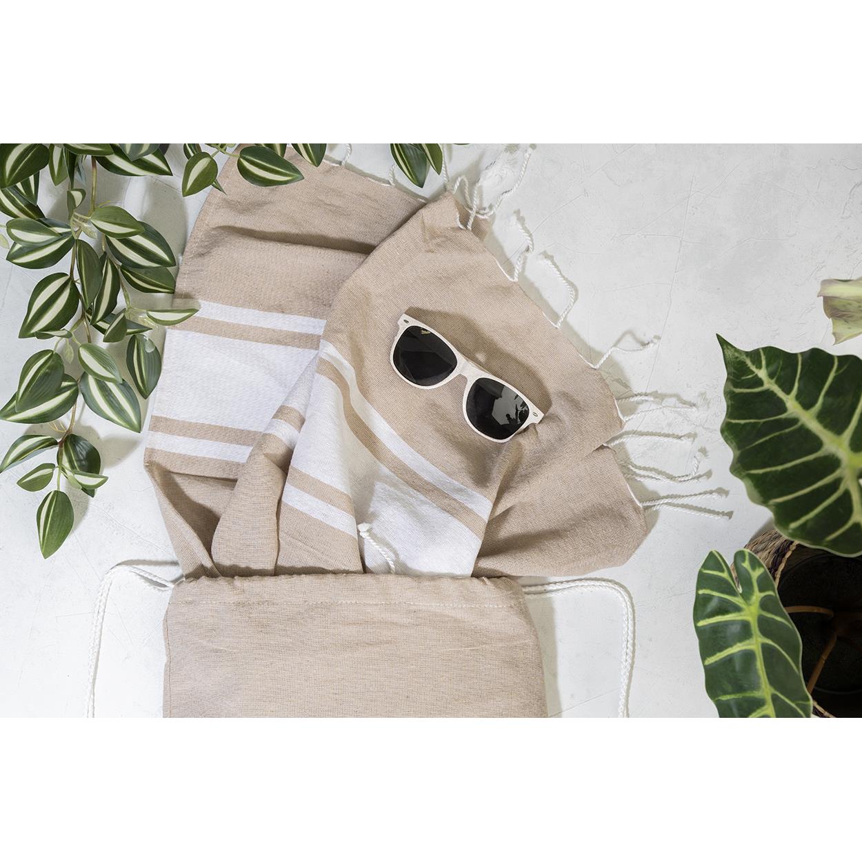 Strandtuch und Turnbeutel aus recycelter Baumwolle