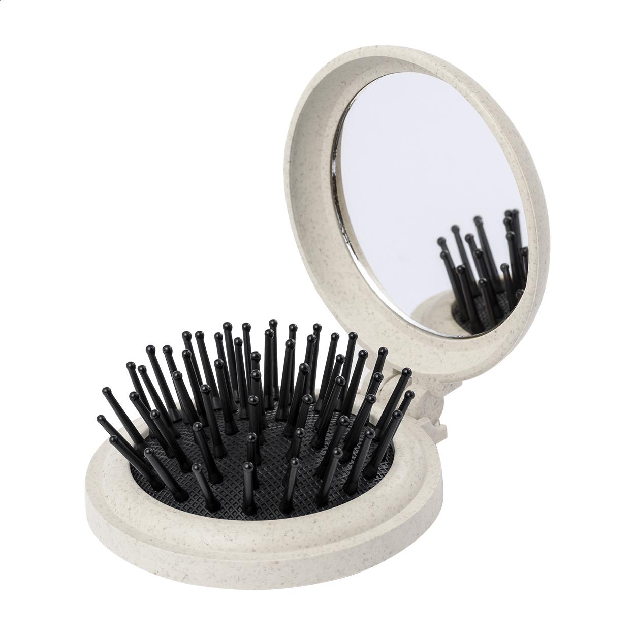 Spiegel mit Haarbürste