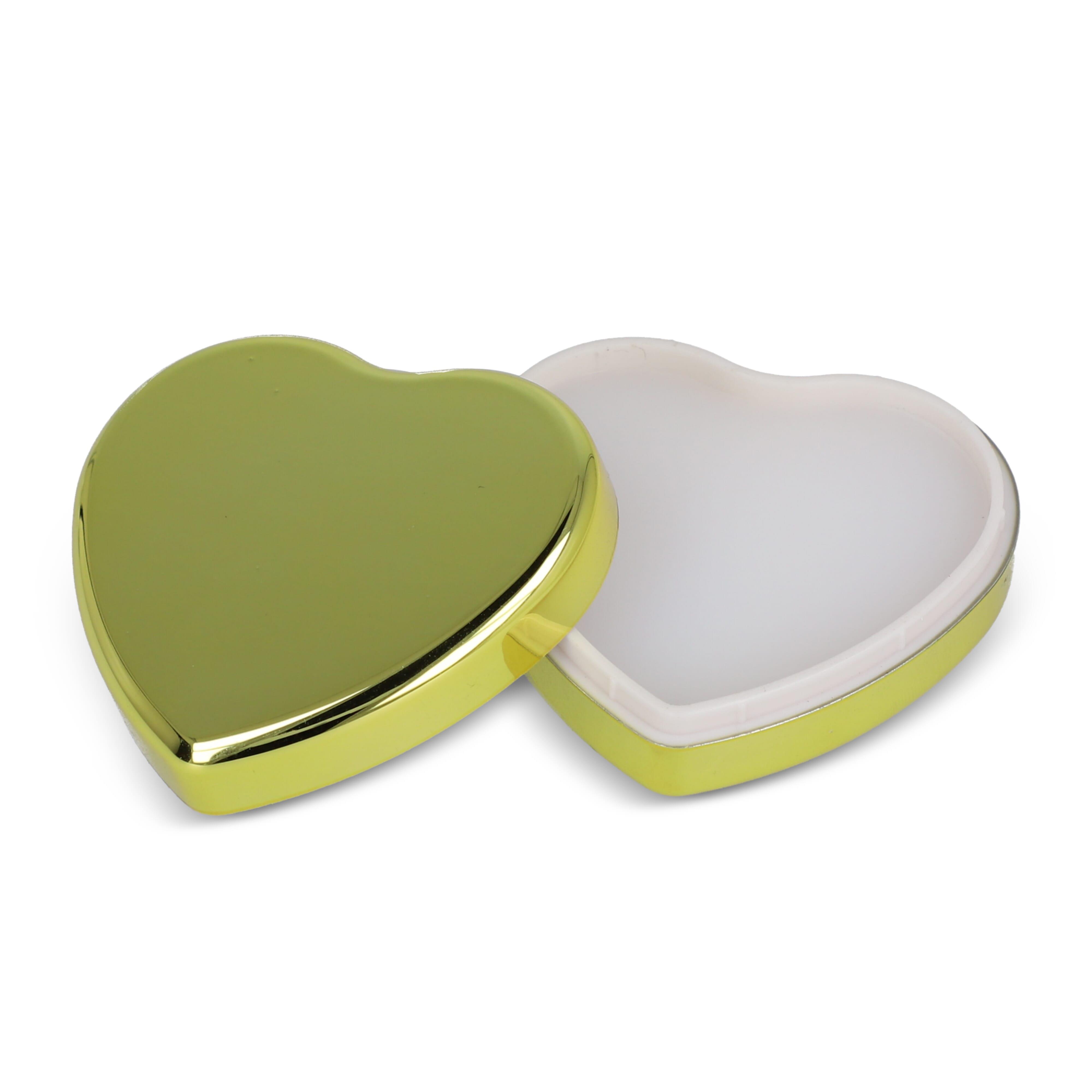 Lippenbalsam  in Flacher metallischer Herzformdose