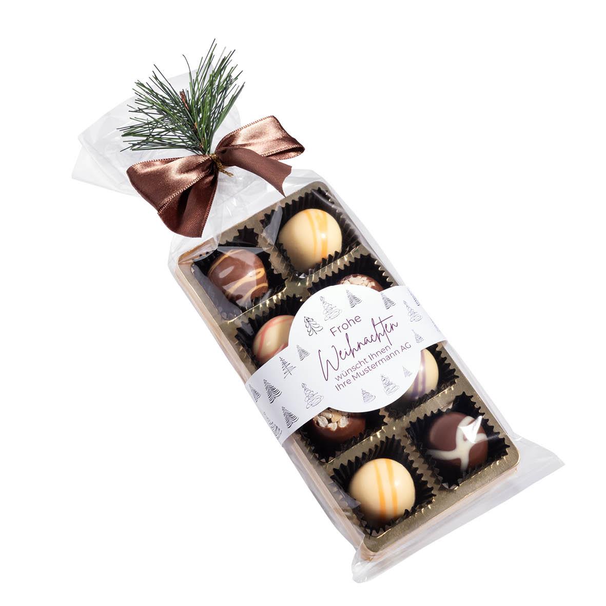 8 PREMIUM-PRALINEN IN TÜTE MIT SCHLEIFE UND WEIHNACHTSAST